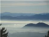jutranje meglice nad Kranjem in pogled vse do Snežnika