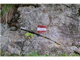 Prima Pala di San Lucano - 2221 m Uganka … kaj počne *x* v oznaki ? Morda je to oznaka za prihajajoče križišče ?